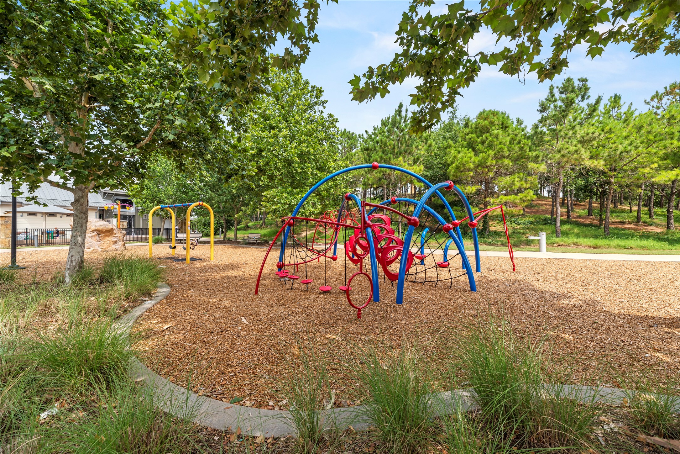 5827 Amherst Farms Lane Fulshear, TX 77441 - Photo 46 of 48 One of Cross Creek Ranch’s thoughtfully designed playgrounds offers a vibrant space for outdoor fun, featuring modern climbing structures, swings, and shaded seating areas. Surrounded by mature trees and landscaped green space, this park provides a safe and inviting environment for children to play while parents relax nearby.