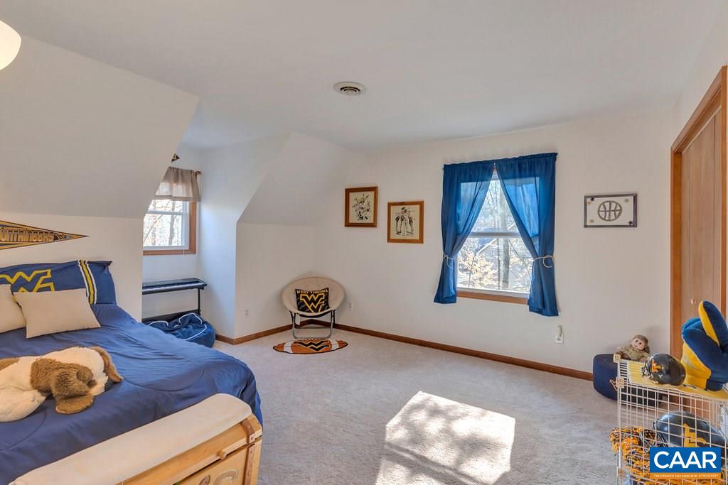 30 East Point Road Palmyra, VA 22963 - Photo 23 of 38 a bedroom with a bed and a window