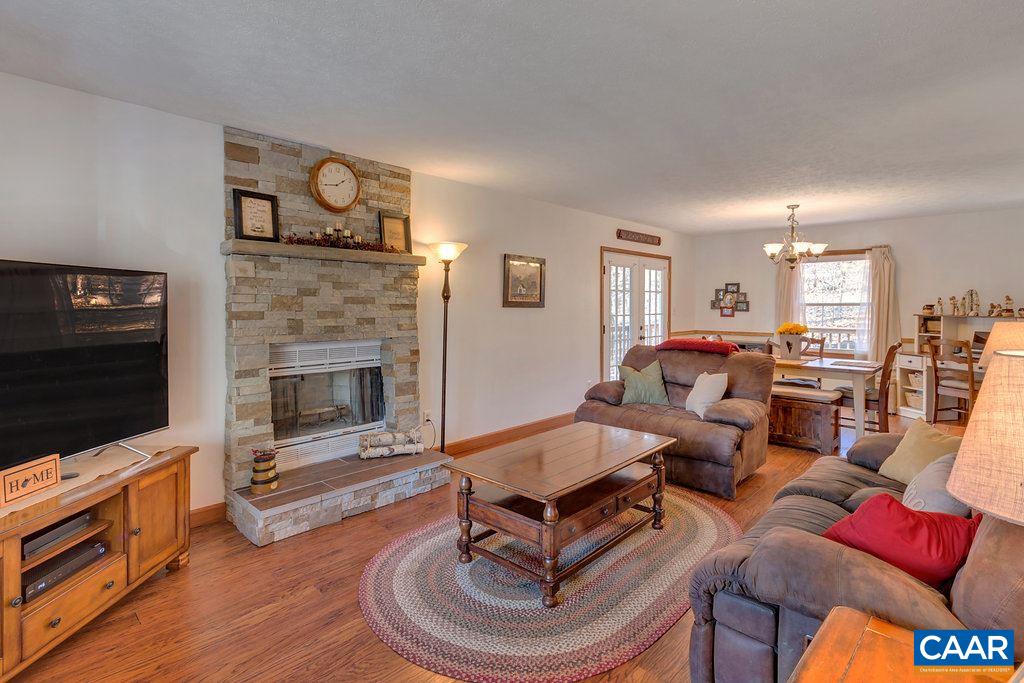 30 East Point Road Palmyra, VA 22963 - Photo 6 of 38 a living room with furniture and a fireplace