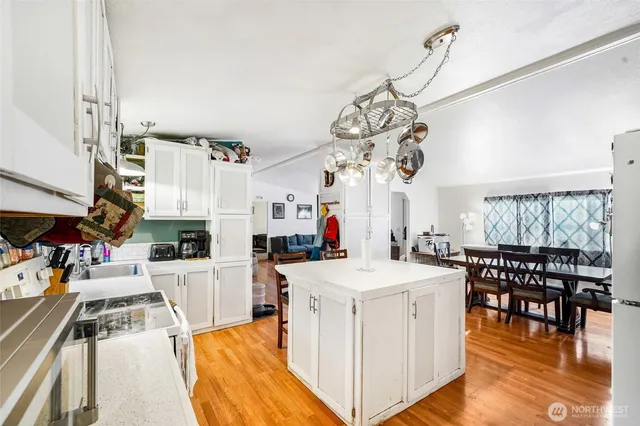 a view of a kitchen and dining room