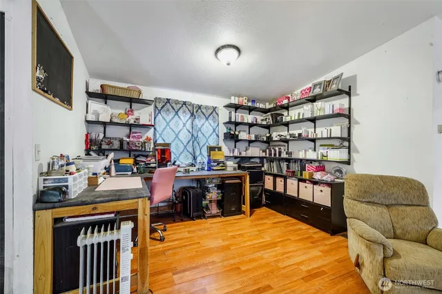 a room with furniture and a book shelf