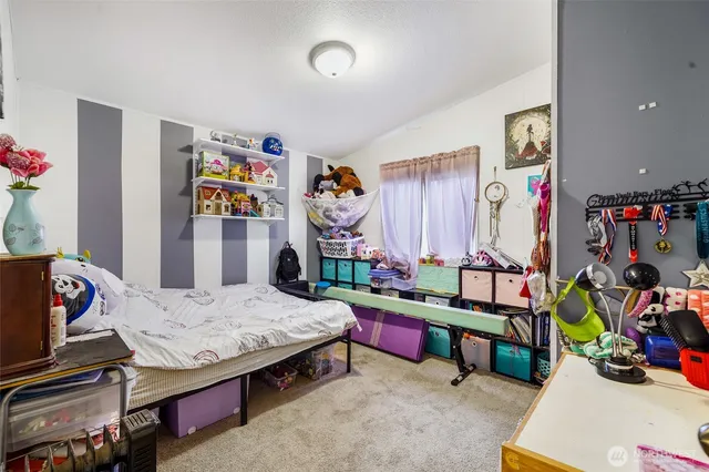 a room with furniture and a couch