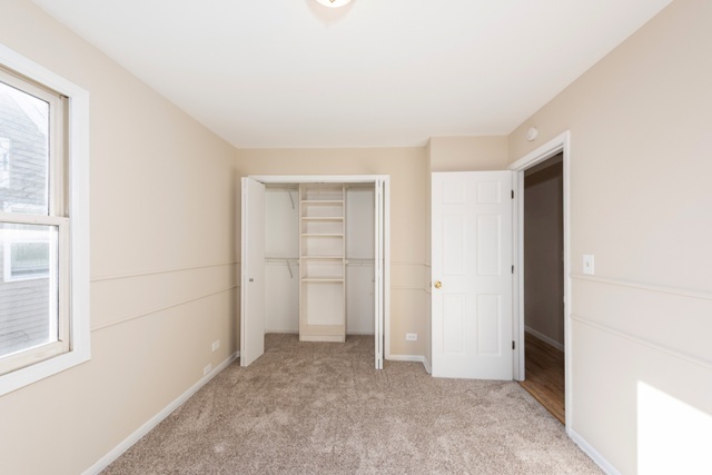 1111 Webster Lane Des Plaines, IL 60016 - Photo 12 of 25 a view of an empty room with a window