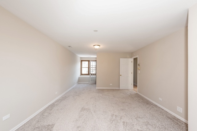 1111 Webster Lane Des Plaines, IL 60016 - Photo 14 of 25 a view of an empty room with a window