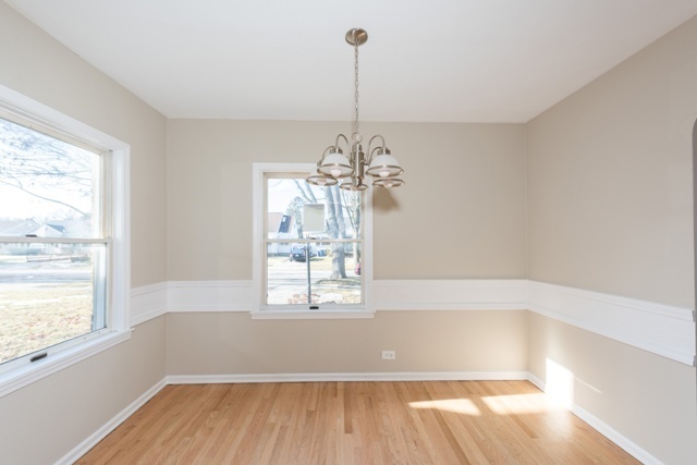 1111 Webster Lane Des Plaines, IL 60016 - Photo 24 of 25 a view of a room with window and chandelier