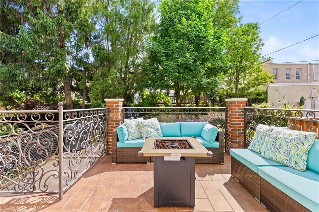 a view of balcony with furniture
