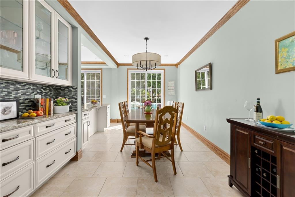 552 77th Street Brooklyn, NY 11209 - Photo 2 of 14 a dining room with furniture and window