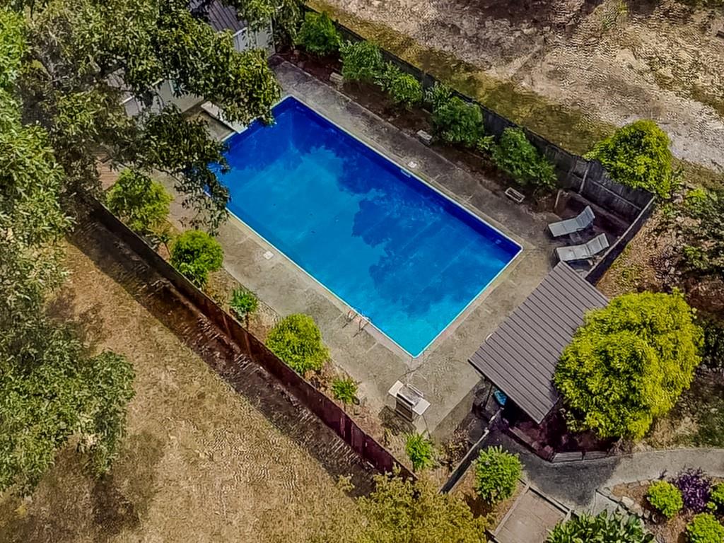 1152 Harbins Road Dacula, GA 30019 - Photo 17 of 33 a view of a yard with an outdoor seating