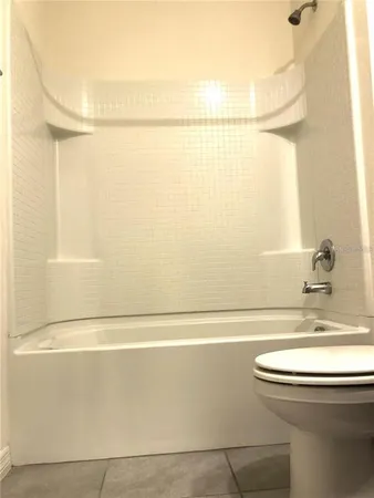 a bathroom with a sink and a shower