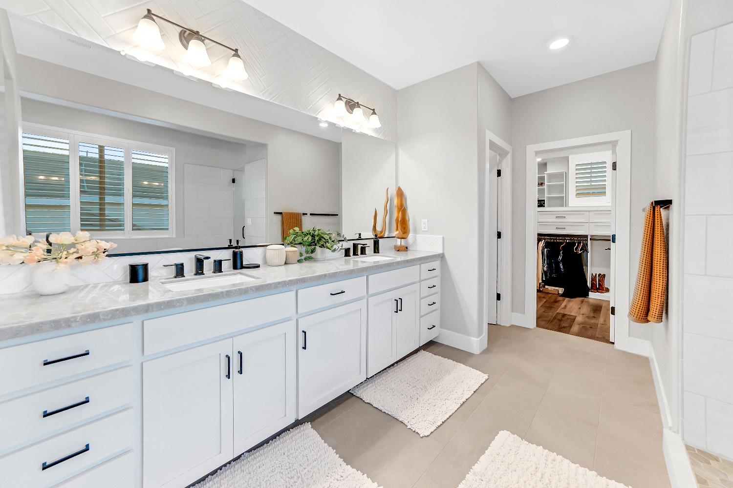 2947 Laredo Drive Rocklin, CA 95765 - Photo 28 of 65 a spacious en suite bathroom with double sink and a mirror