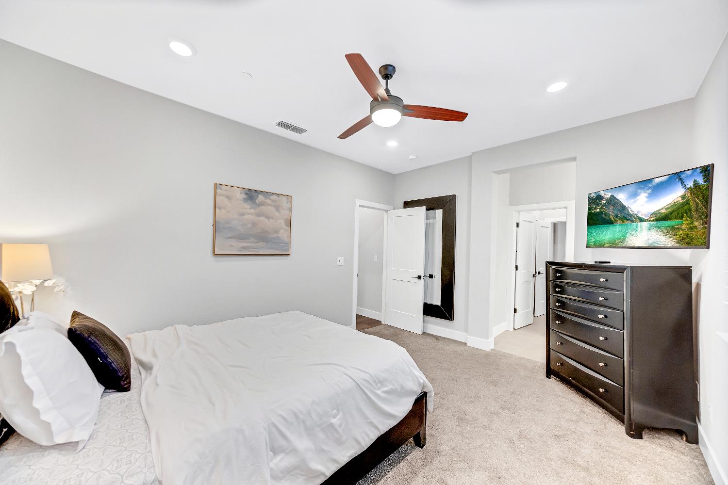 2947 Laredo Drive Rocklin, CA 95765 - Photo 32 of 65 a bedroom with a bed and a flat screen tv