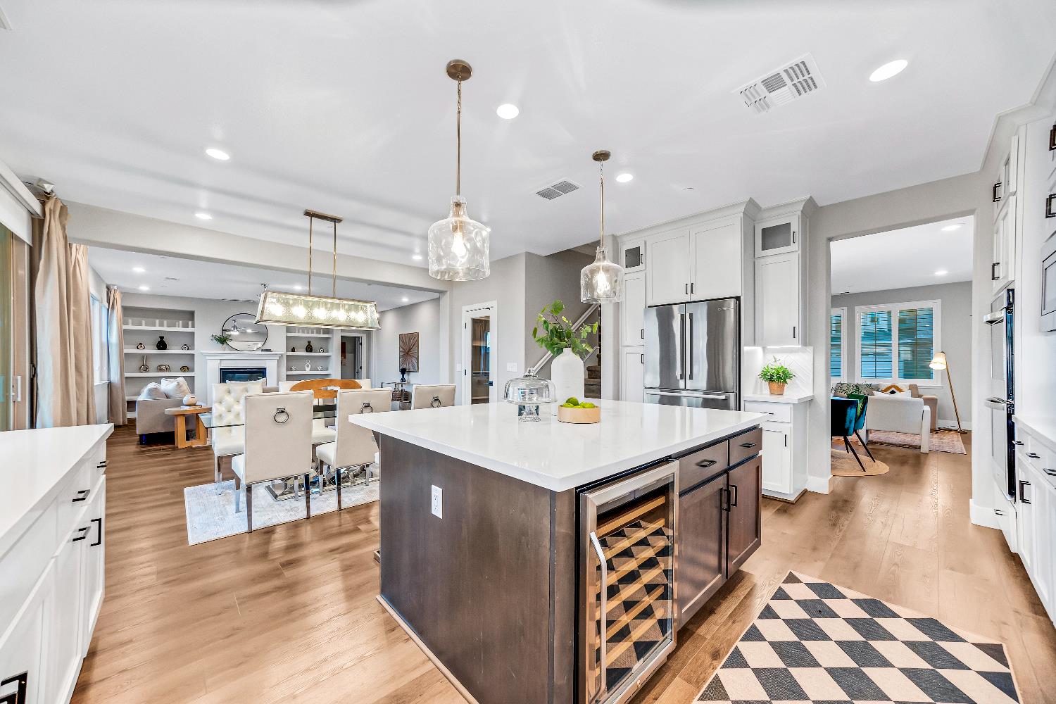 2947 Laredo Drive Rocklin, CA 95765 - Photo 44 of 65 a large kitchen with a counter space a sink appliances and living room view