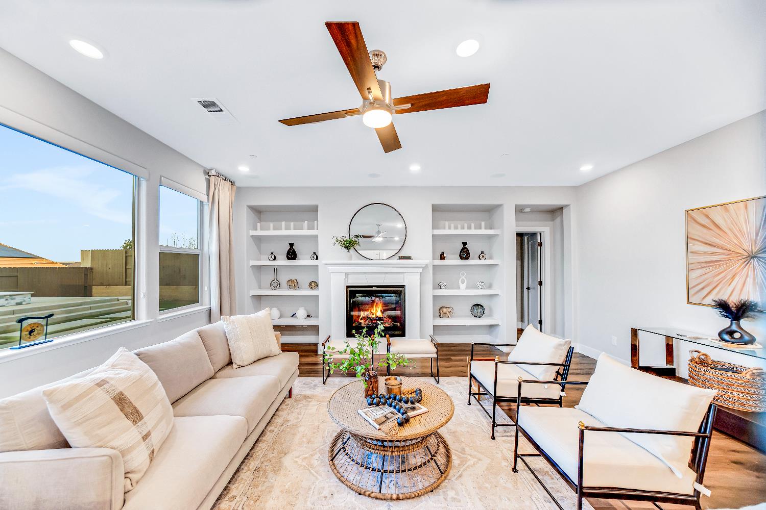 2947 Laredo Drive Rocklin, CA 95765 - Photo 8 of 65 a living room with fireplace furniture and a large window