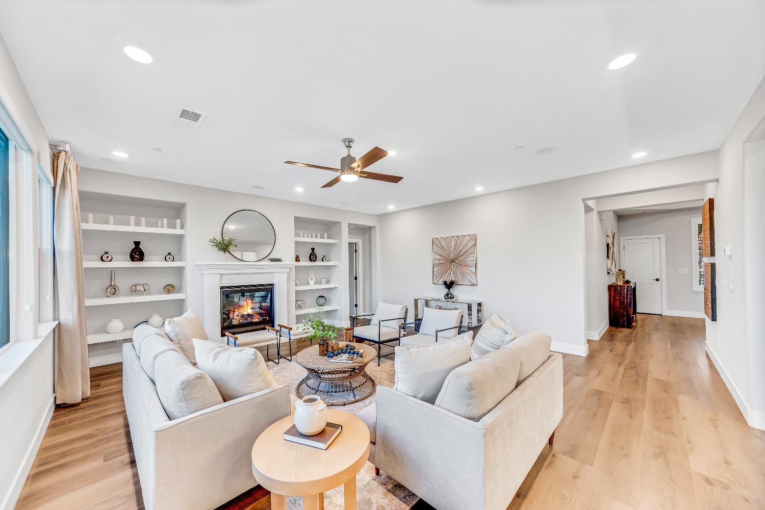 2947 Laredo Drive Rocklin, CA 95765 - Photo 9 of 65 a living room with furniture and a fireplace