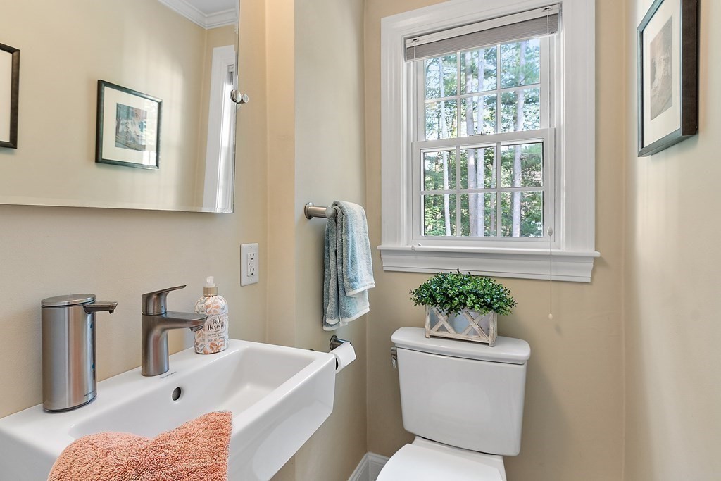 21 Oneida Road Acton, MA 01720 - Photo 19 of 39 a bathroom with a sink and a bathtub