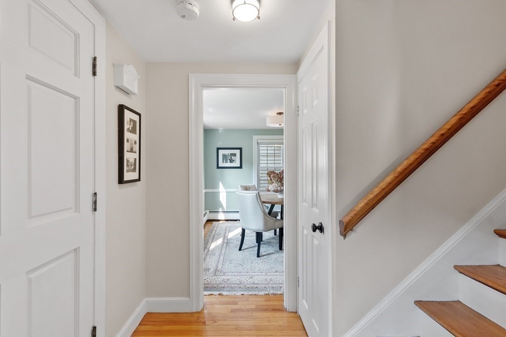 21 Oneida Road Acton, MA 01720 - Photo 20 of 39 a view of a hallway with wooden floor and entryway