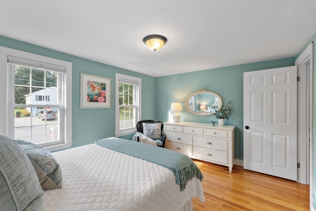 21 Oneida Road Acton, MA 01720 - Photo 22 of 39 a bedroom with a bed and a dresser