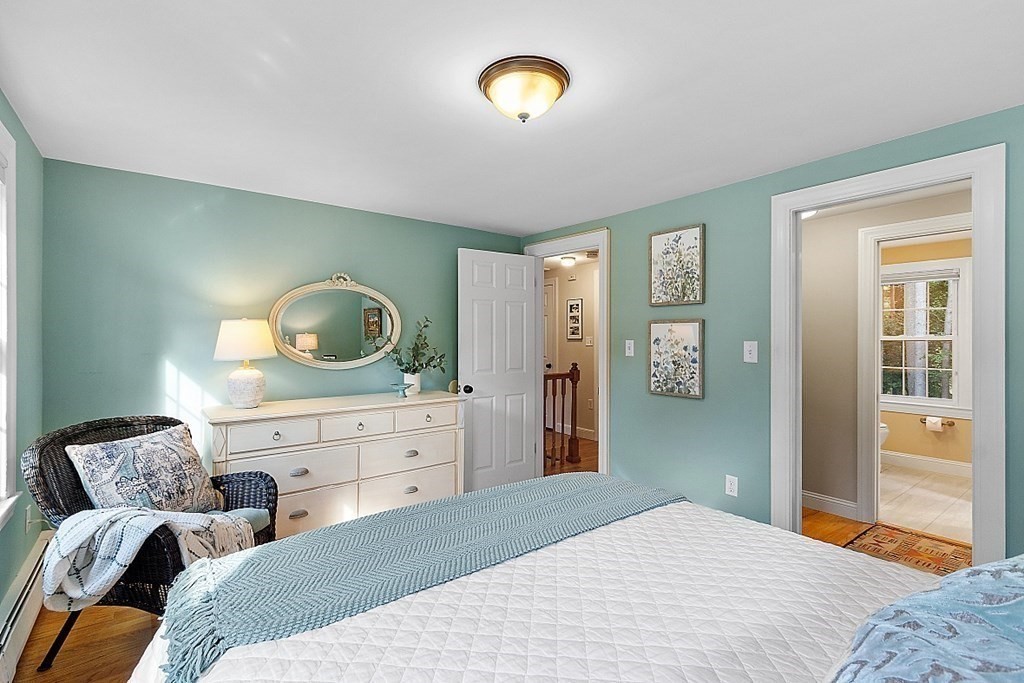 21 Oneida Road Acton, MA 01720 - Photo 23 of 39 a bedroom with a bed and a dresser