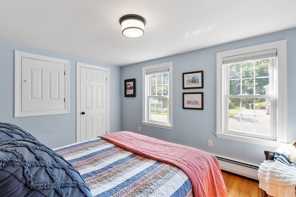 21 Oneida Road Acton, MA 01720 - Photo 28 of 39 a bedroom with a bed and a window
