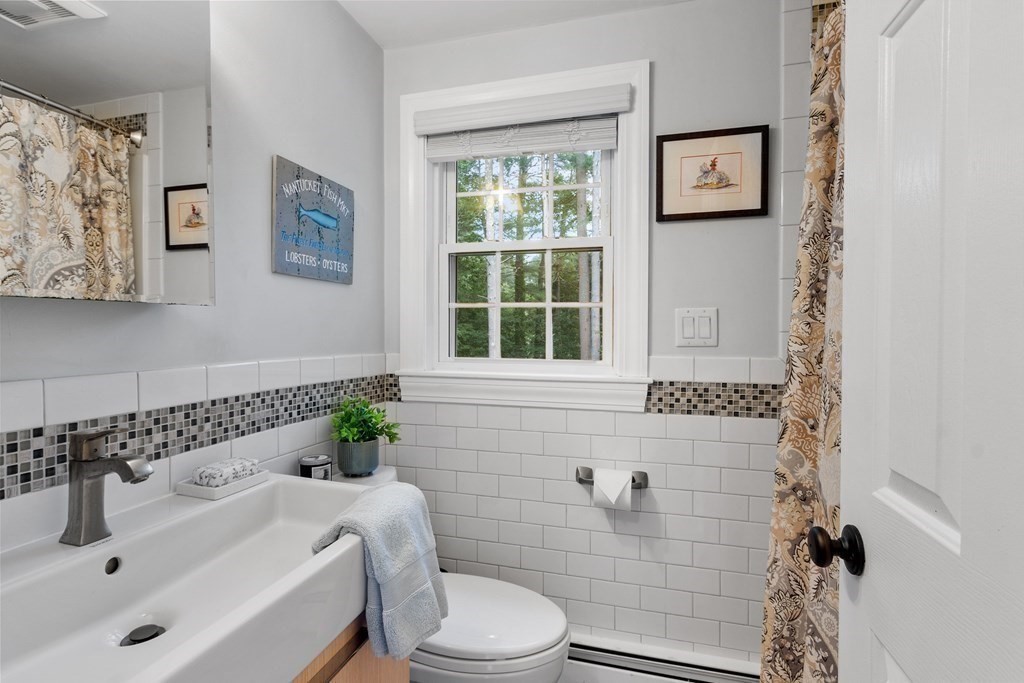 21 Oneida Road Acton, MA 01720 - Photo 31 of 39 a bathroom with a sink toilet and shower