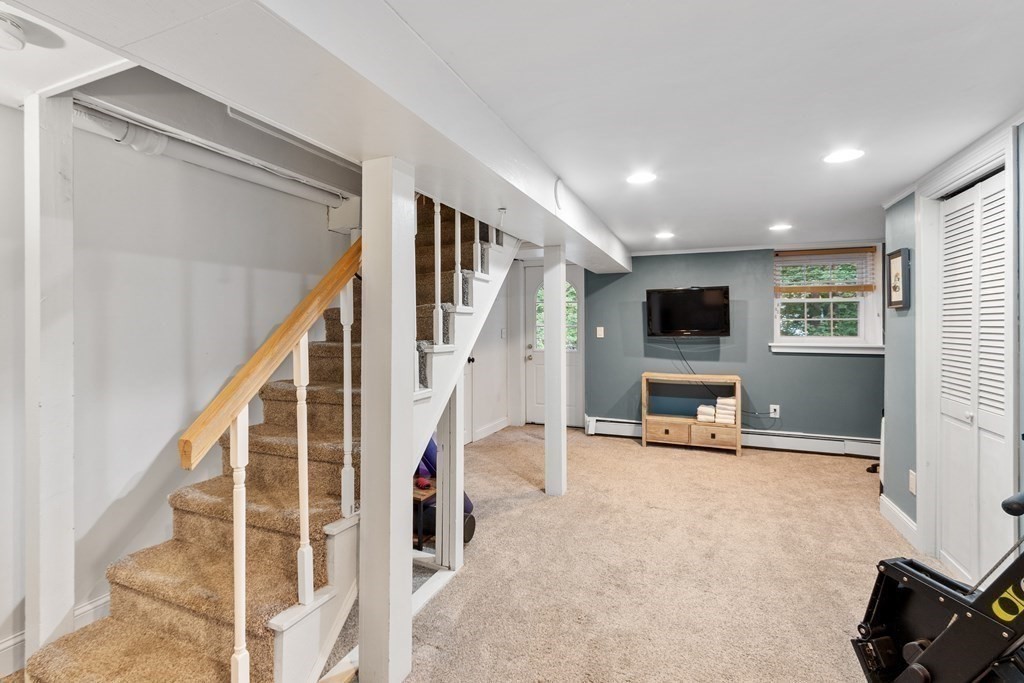 21 Oneida Road Acton, MA 01720 - Photo 32 of 39 a view of entryway with furniture and livingroom view