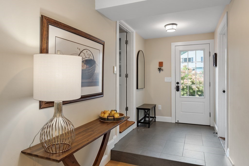 21 Oneida Road Acton, MA 01720 - Photo 6 of 39 a living room with furniture and a window