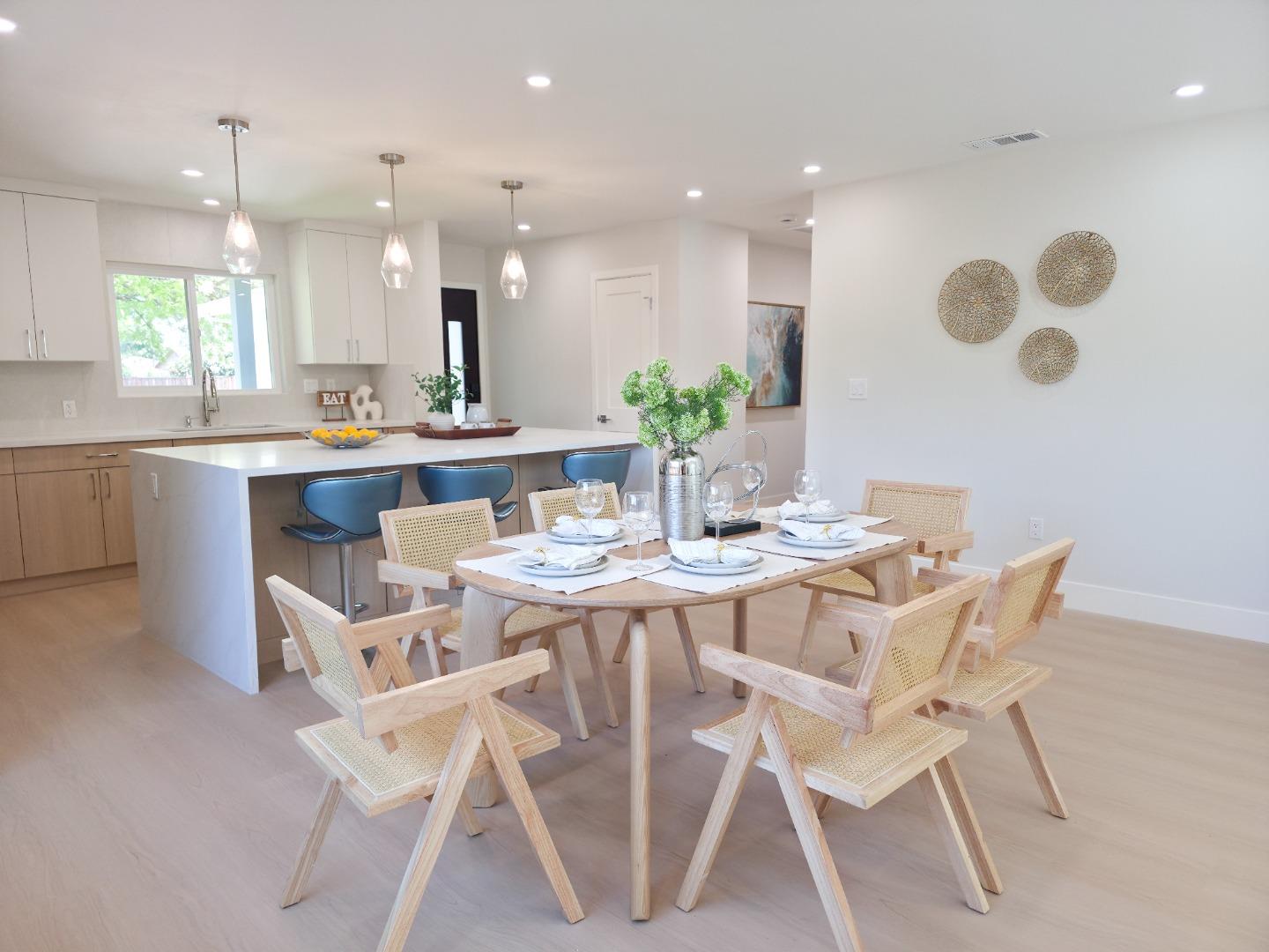 6746 Bollinger Road San Jose, CA 95129 - Photo 8 of 30 a dining room with a table and chairs