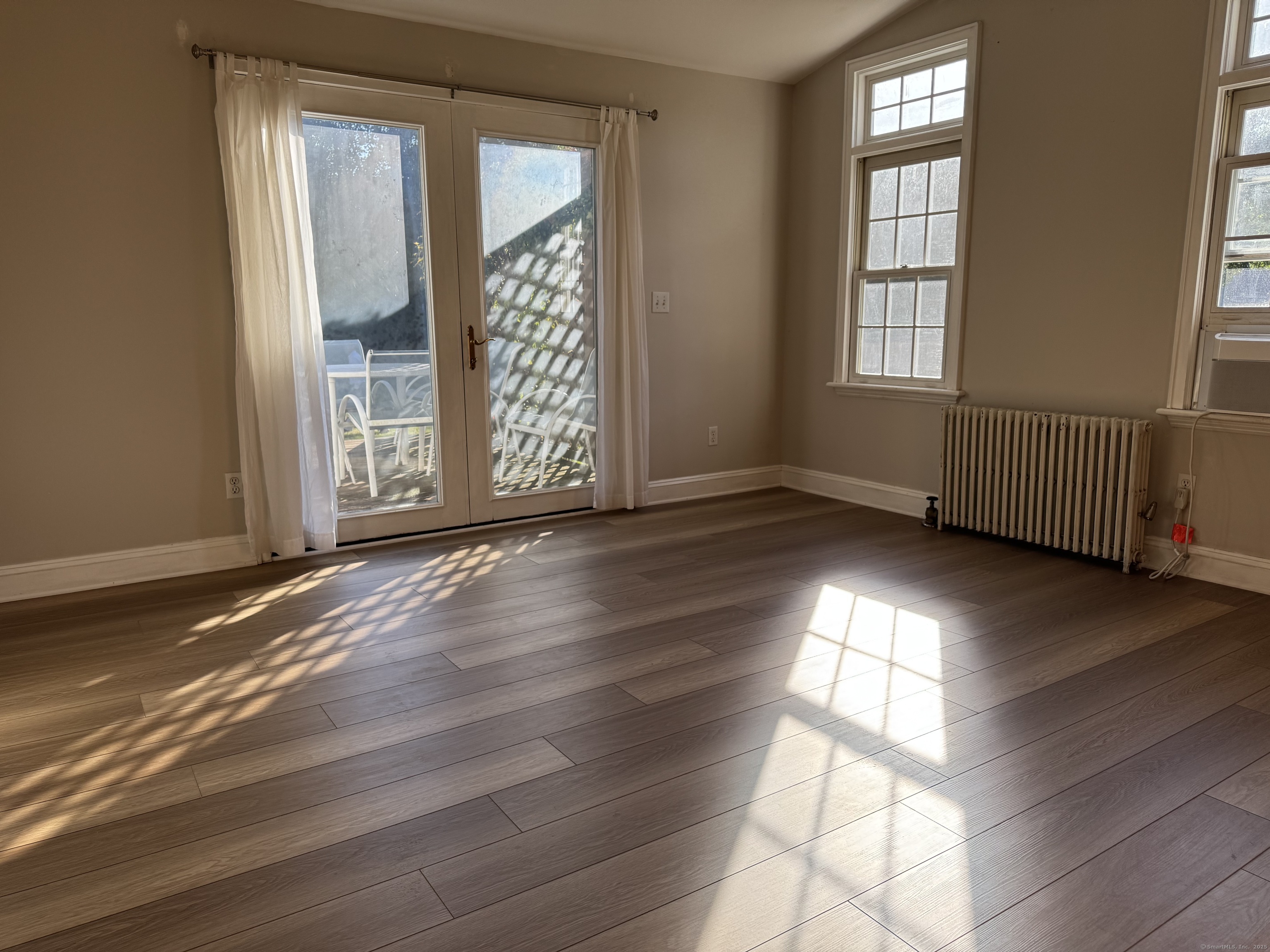 15 West Parish Road Westport, CT 06880 - Photo 4 of 26 Family room to the deck out back