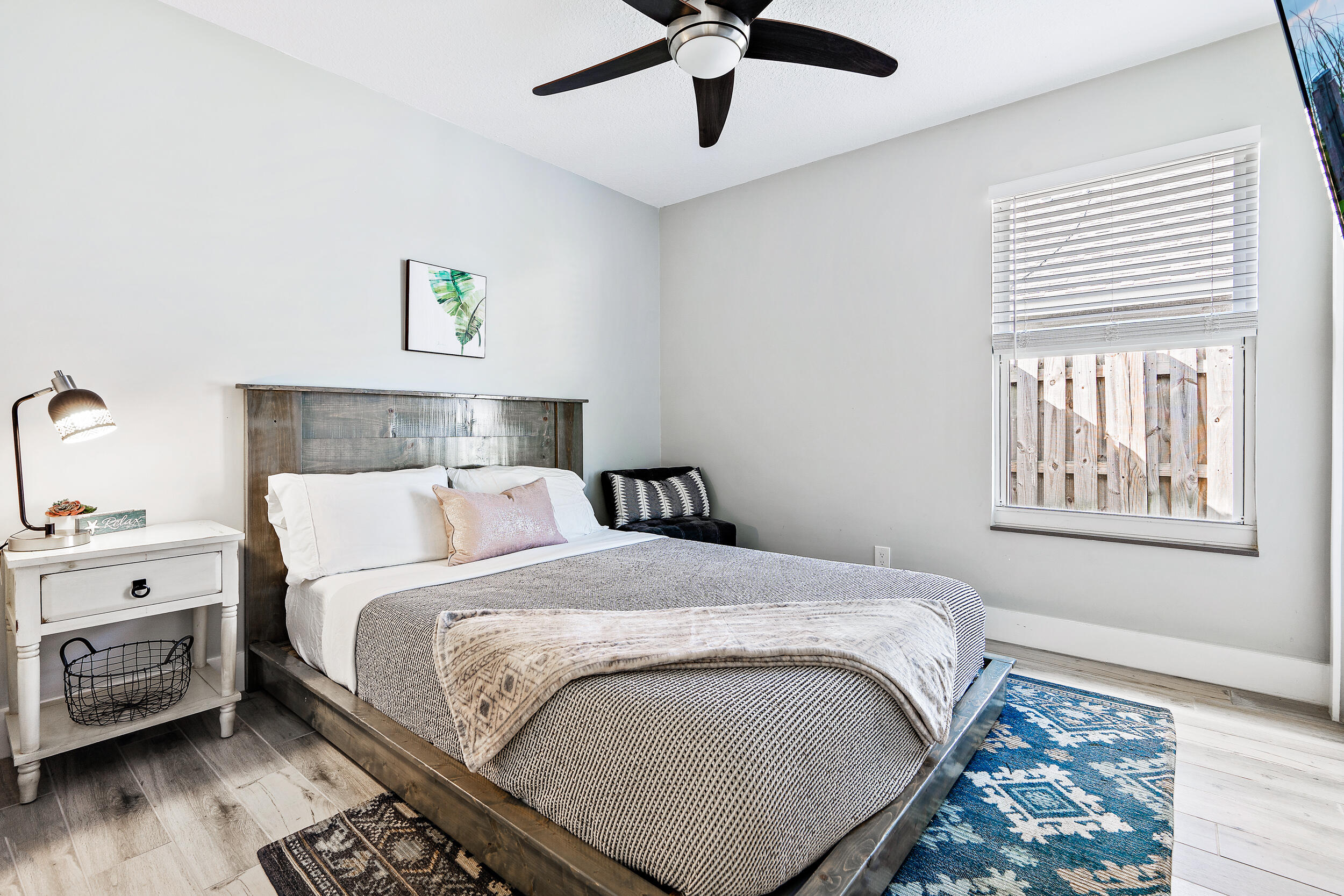 6219 Linton Street Jupiter, FL 33458 - Photo 16 of 41 a bedroom with a bed and a window