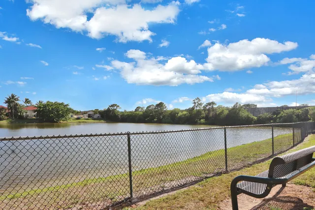 a view of a lake from a balcony