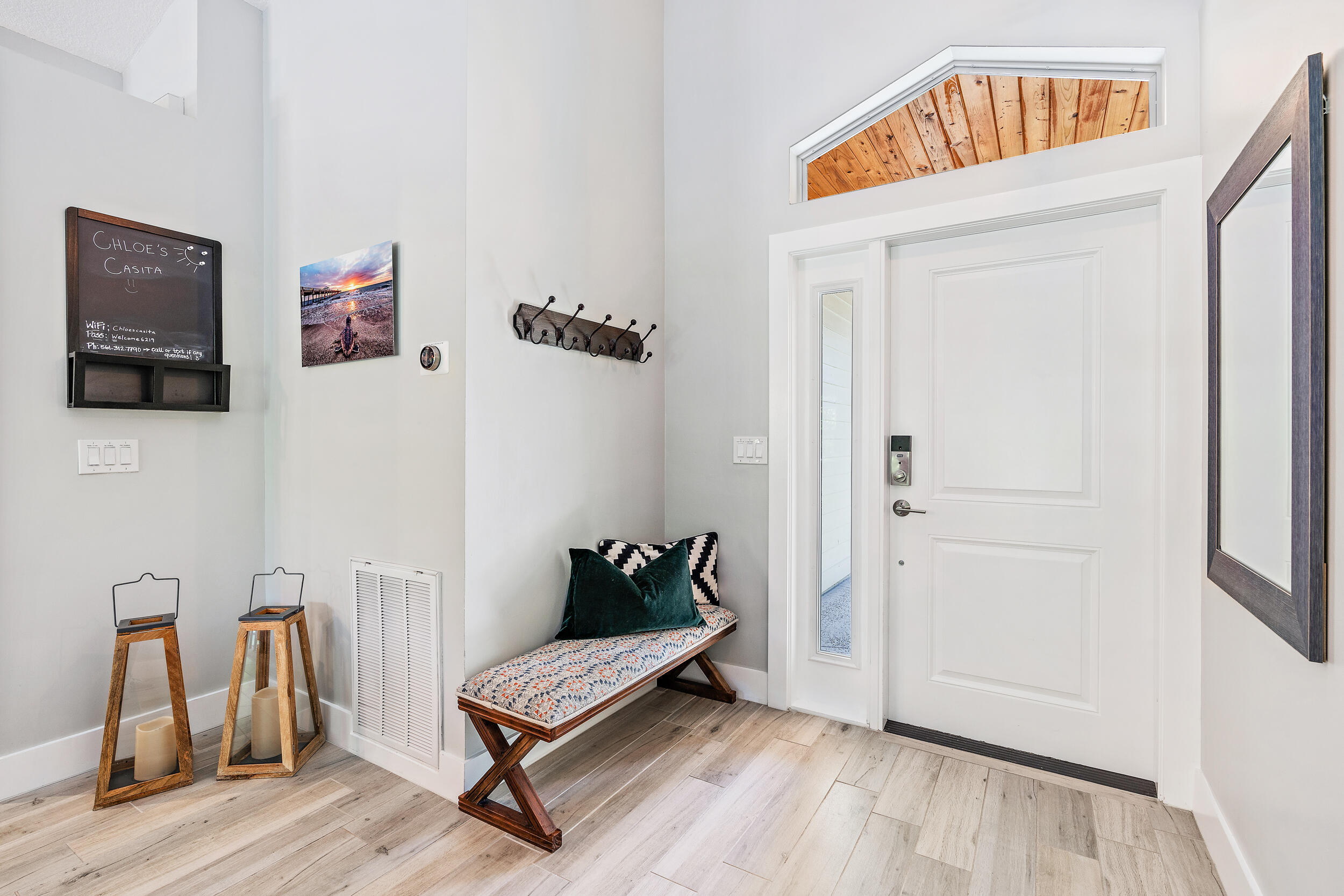 6219 Linton Street Jupiter, FL 33458 - Photo 4 of 41 a living room with furniture and a wooden floor