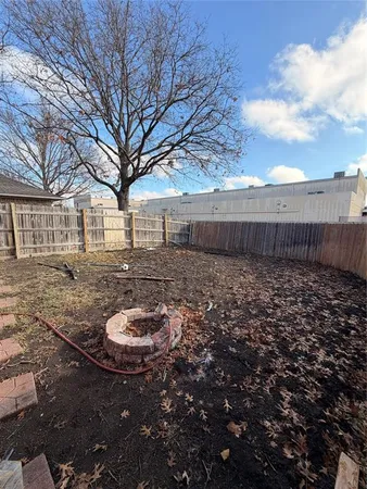 a swimming pool with wooden fence