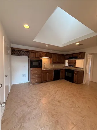 a view of a kitchen with a sink