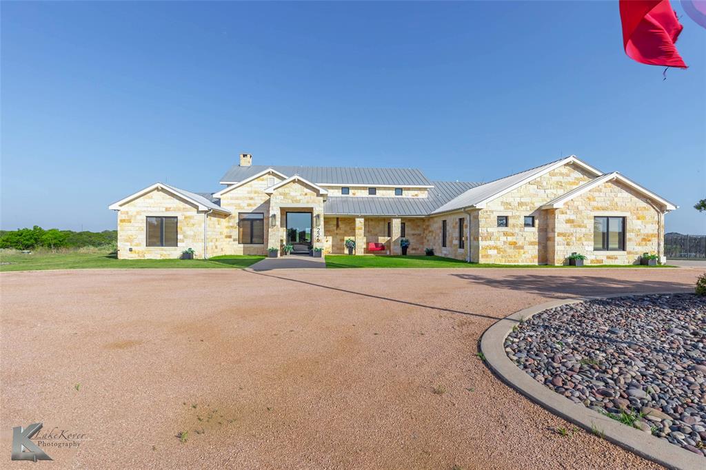 226 Rabbit Run Tuscola, TX 79562 - Photo 3 of 4 a front view of a house with a street