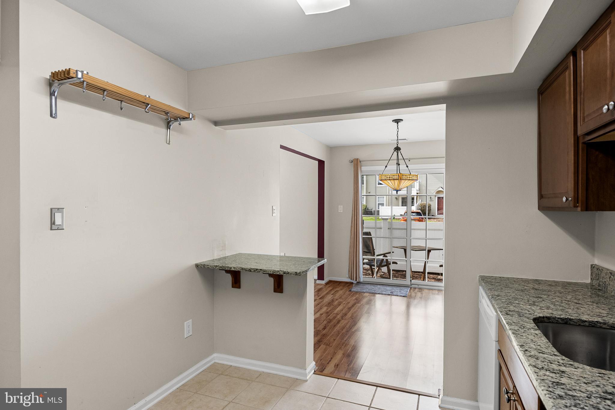 3704 Fenwick Lane Mount Laurel, NJ 08054 - Photo 13 of 26 a view of a hallway with wooden floor and a living room