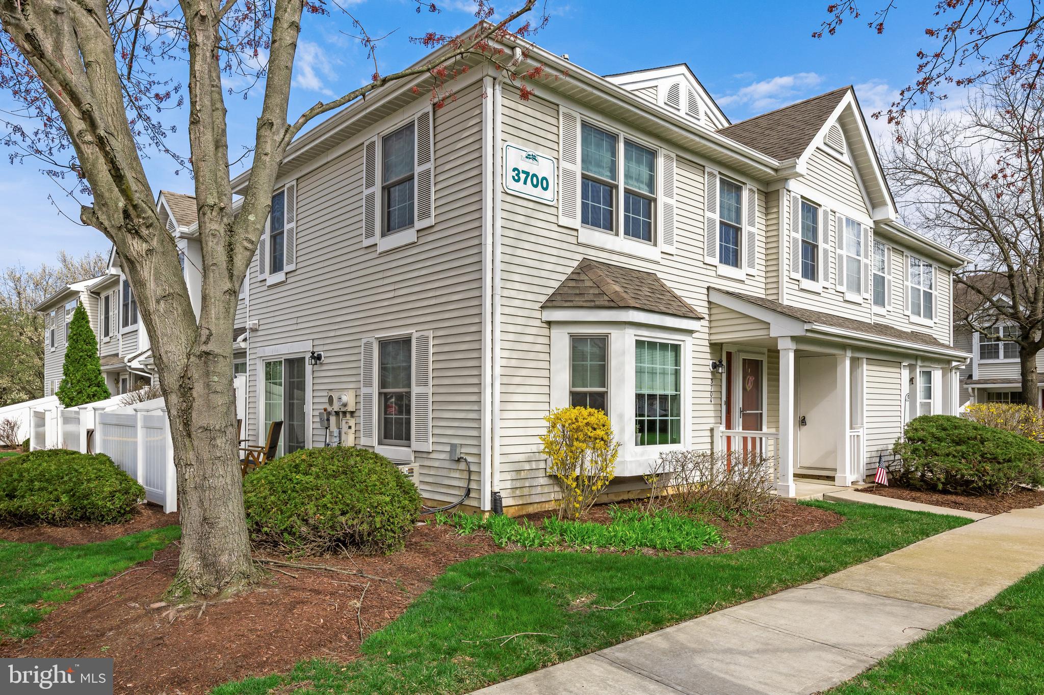 3704 Fenwick Lane Mount Laurel, NJ 08054 - Photo 2 of 26 a front view of a house with a garden
