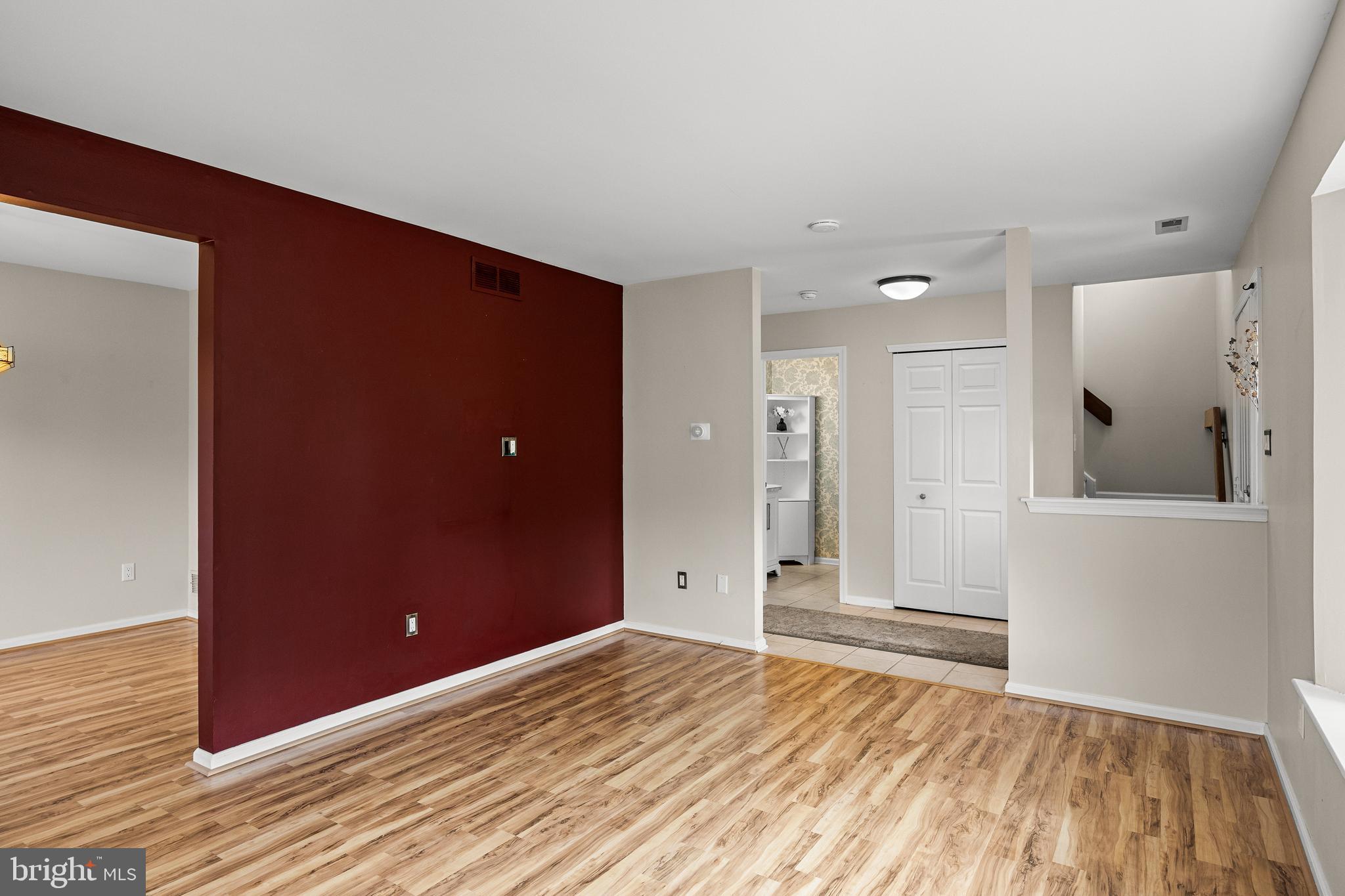 3704 Fenwick Lane Mount Laurel, NJ 08054 - Photo 8 of 26 a view of a livingroom with wooden floor and cabinet