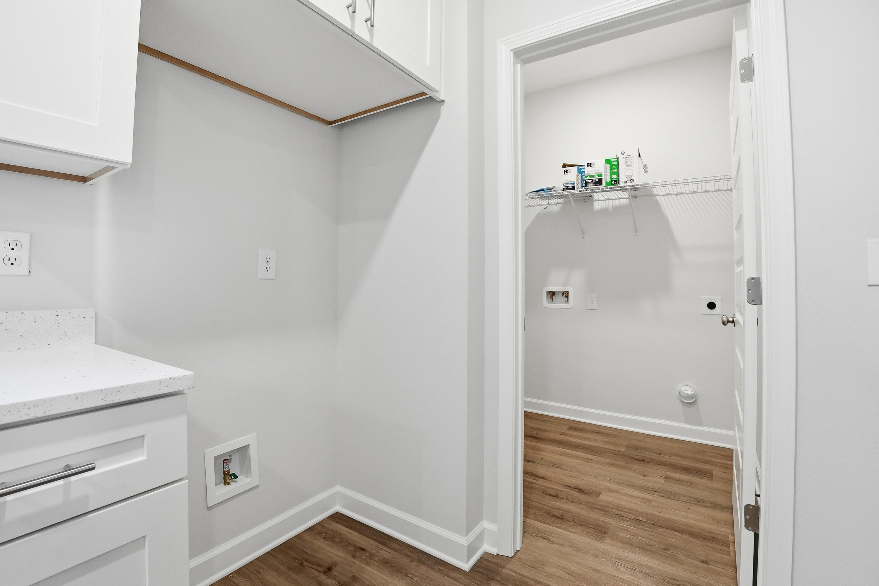 6194 Winstead Cove Crestview, FL 32539 - Photo 15 of 17 a view of an empty room with wooden floor