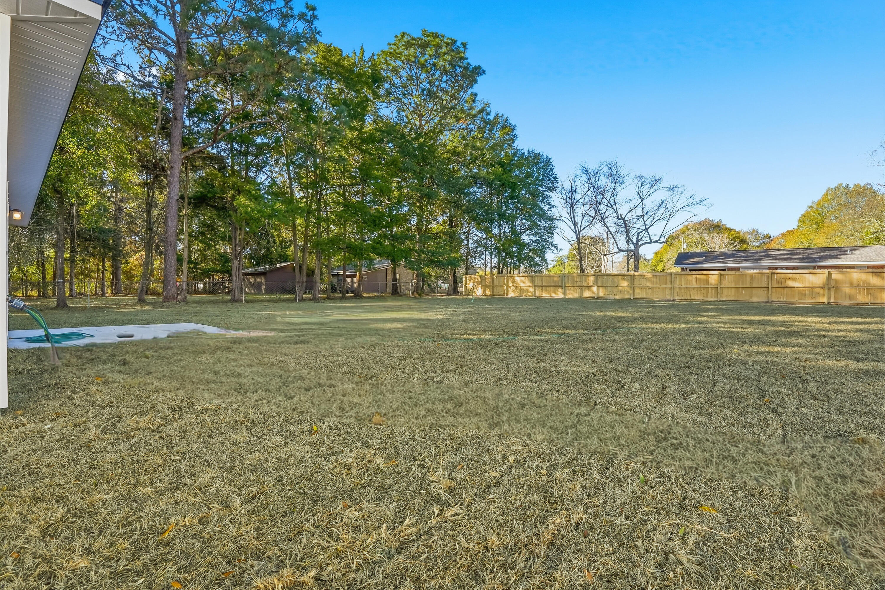 6194 Winstead Cove Crestview, FL 32539 - Photo 16 of 17 a view of a green field with clear sky