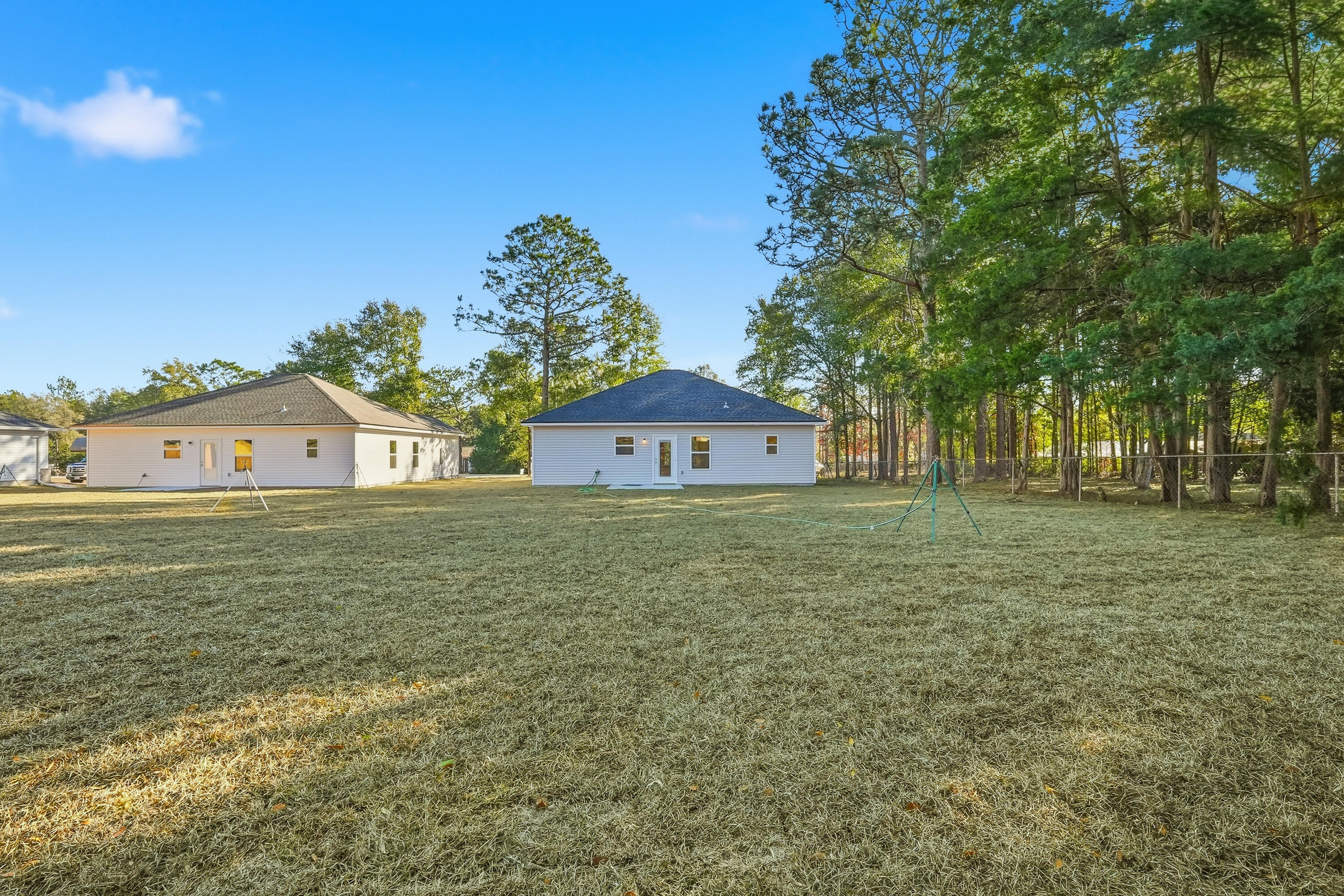 6194 Winstead Cove Crestview, FL 32539 - Photo 17 of 17 a front view of a house with a yard