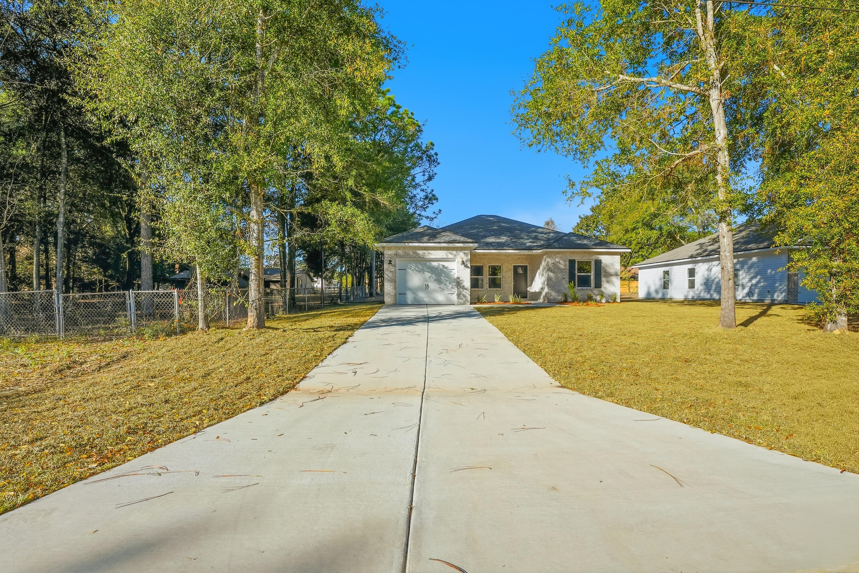 6194 Winstead Cove Crestview, FL 32539 - Photo 2 of 17 a view of house with swimming pool outdoor seating