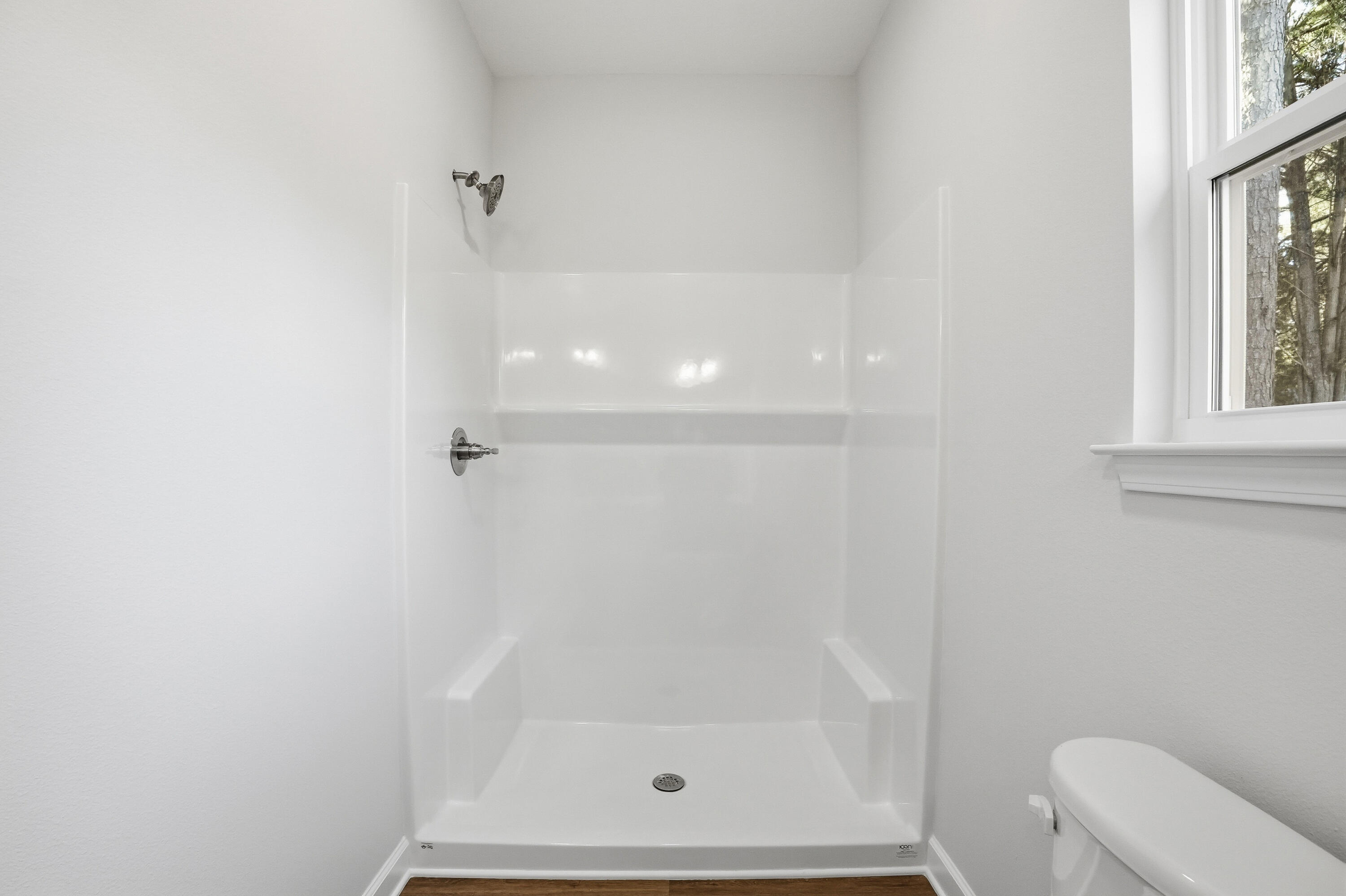 6194 Winstead Cove Crestview, FL 32539 - Photo 10 of 17 a bathroom with a shower