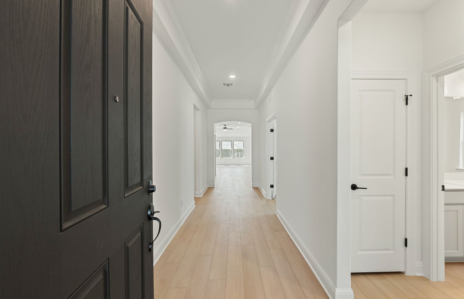 116 Elm Vw Drive Georgetown, TX 78628 - Photo 5 of 30 a view of a hallway with a wooden floor
