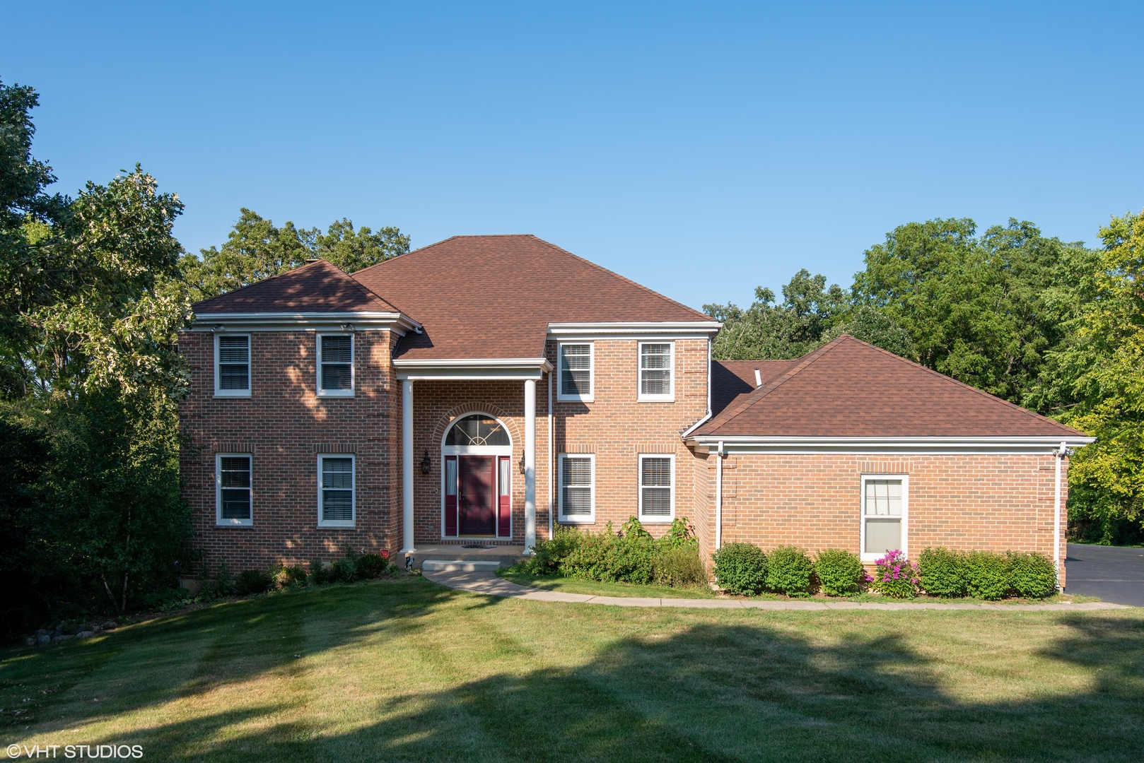 35W521 Parsons Road Dundee, IL 60102 - Photo 1 of 18 a front view of a house with a yard and garage