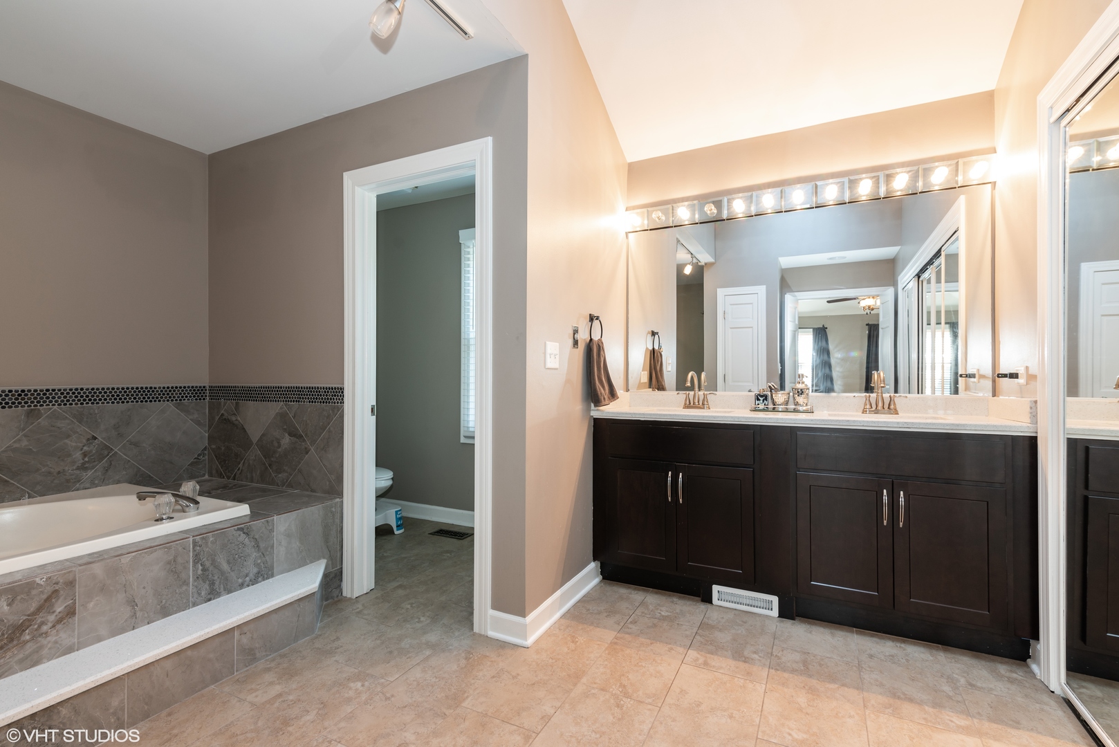 35W521 Parsons Road Dundee, IL 60102 - Photo 11 of 18 a spacious bathroom with a bathtub sink and mirror