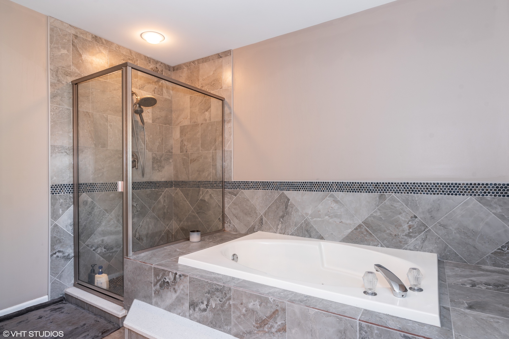 35W521 Parsons Road Dundee, IL 60102 - Photo 12 of 18 a bathroom with a white bathtub and a toilet