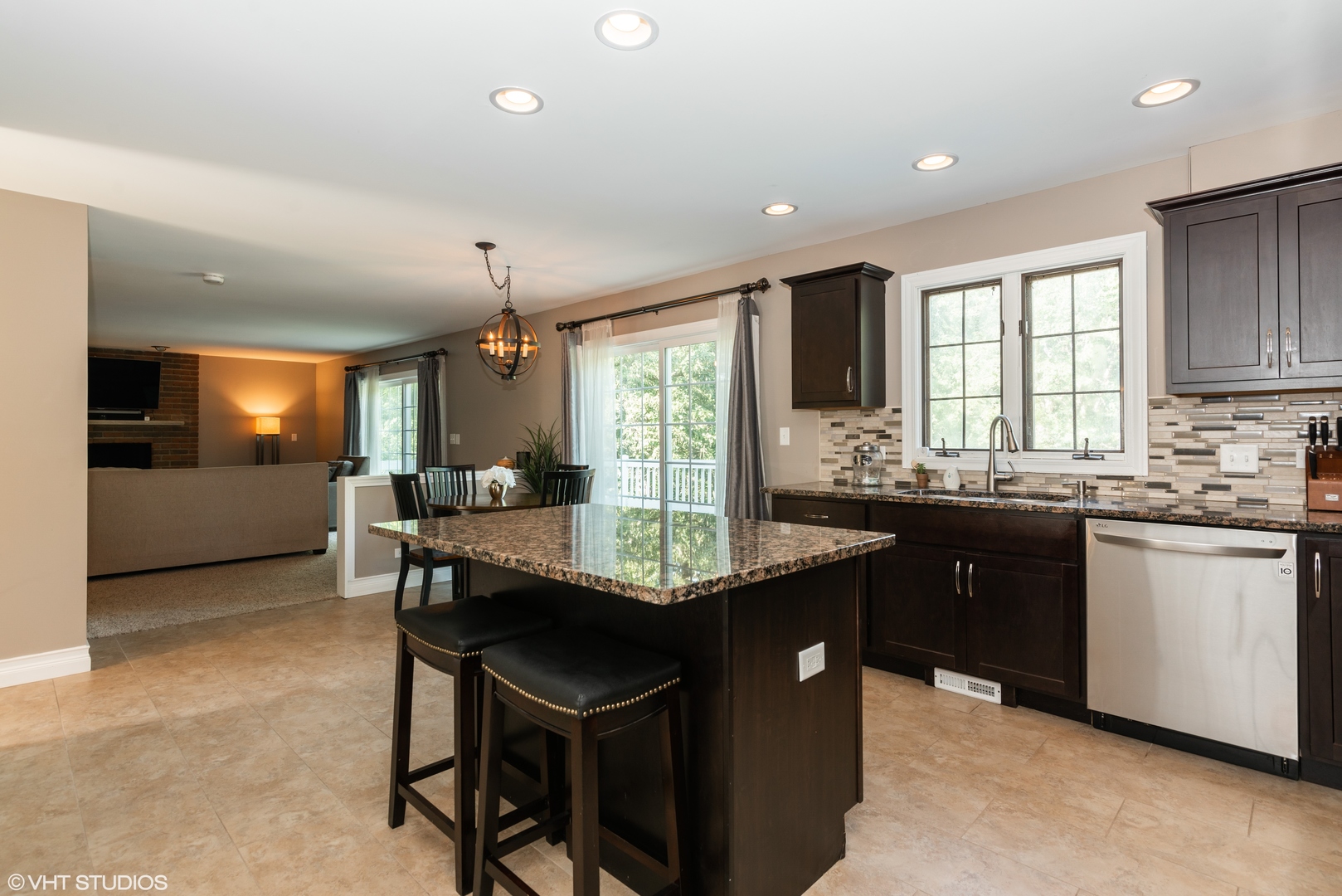 35W521 Parsons Road Dundee, IL 60102 - Photo 5 of 18 a kitchen with kitchen island granite countertop a sink and cabinets