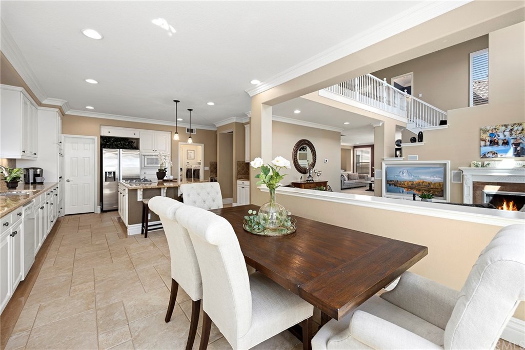 2442 Hawksfield Way Orange, CA 92867 - Photo 12 of 28 a large kitchen with a table and chairs