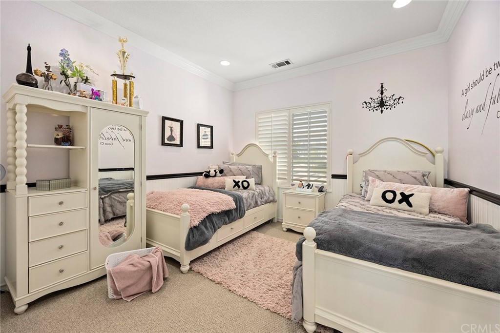 2442 Hawksfield Way Orange, CA 92867 - Photo 19 of 28 a bedroom with a bed and a cabinets