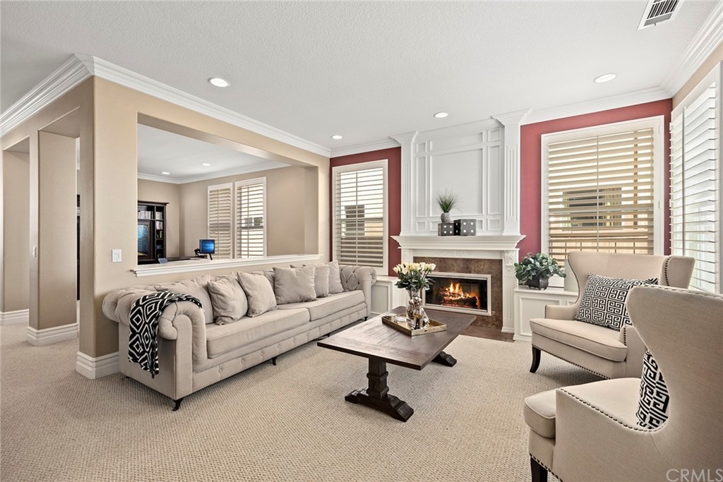 2442 Hawksfield Way Orange, CA 92867 - Photo 5 of 28 a living room with furniture and a fireplace